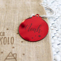 Nikolaus Jutesack Namensschild Rot