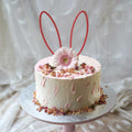 Ostertorte mit rosa Hasenohren Acryl Himbeere chic